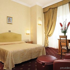 Kamer met een Queen Size Bed